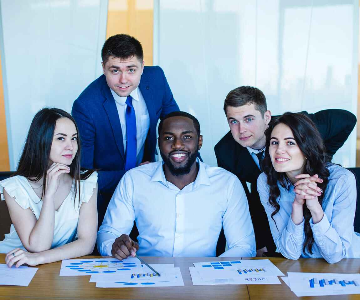 Diverse team collaborating on a project at techdart Pvt. Ltd., showcasing teamwork and corporate culture